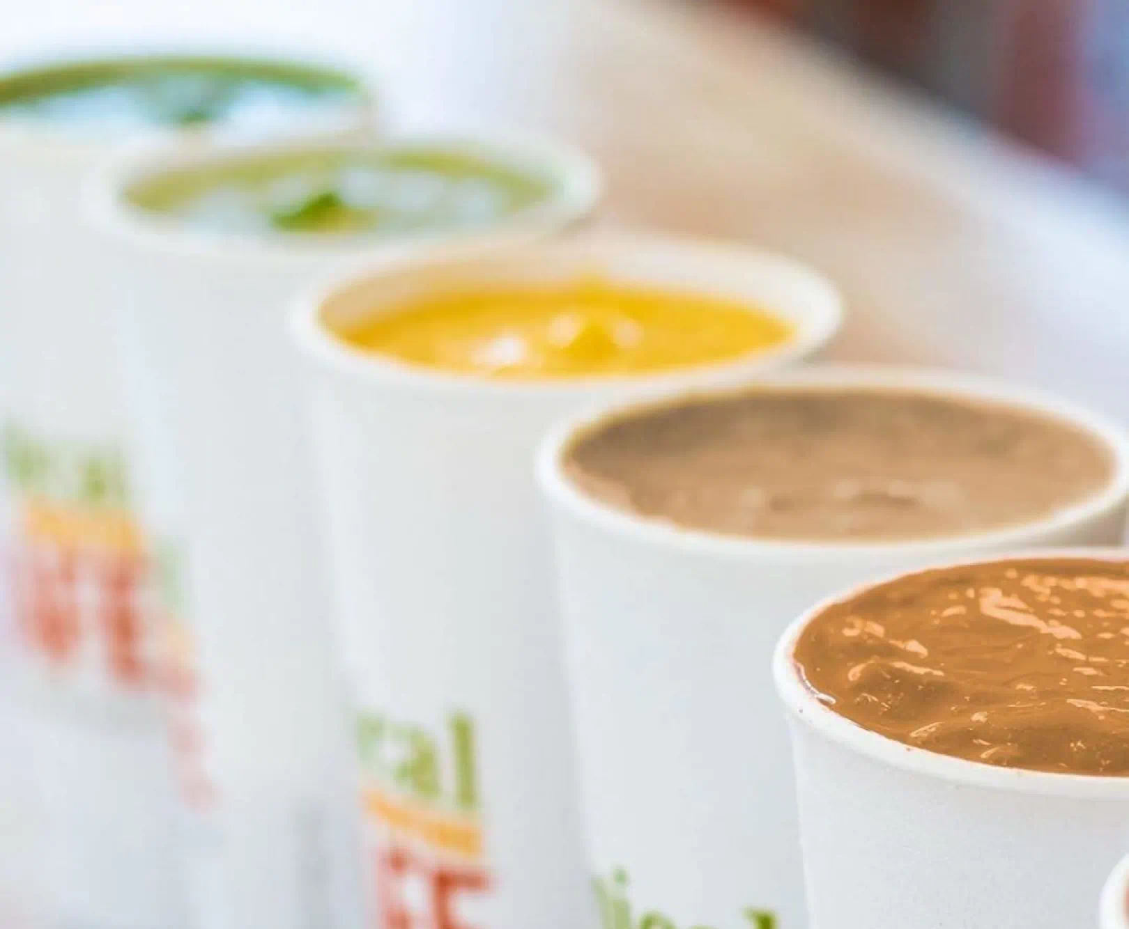 row of smoothie cups